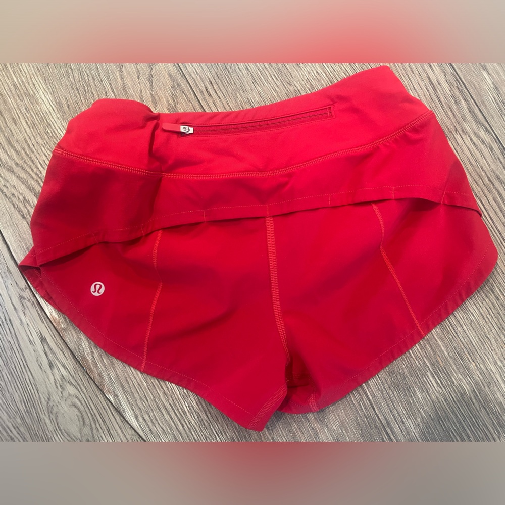 Red Lululemon shorts